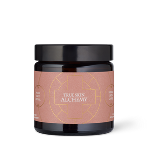 Jar with 'True Skin Alchemy' label on a white background